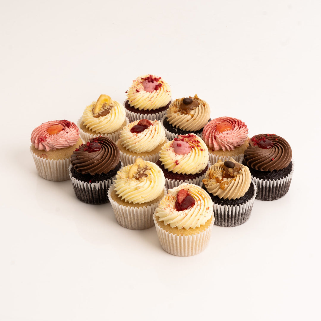 Assorted cupcake selection box featuring six handcrafted flavours.