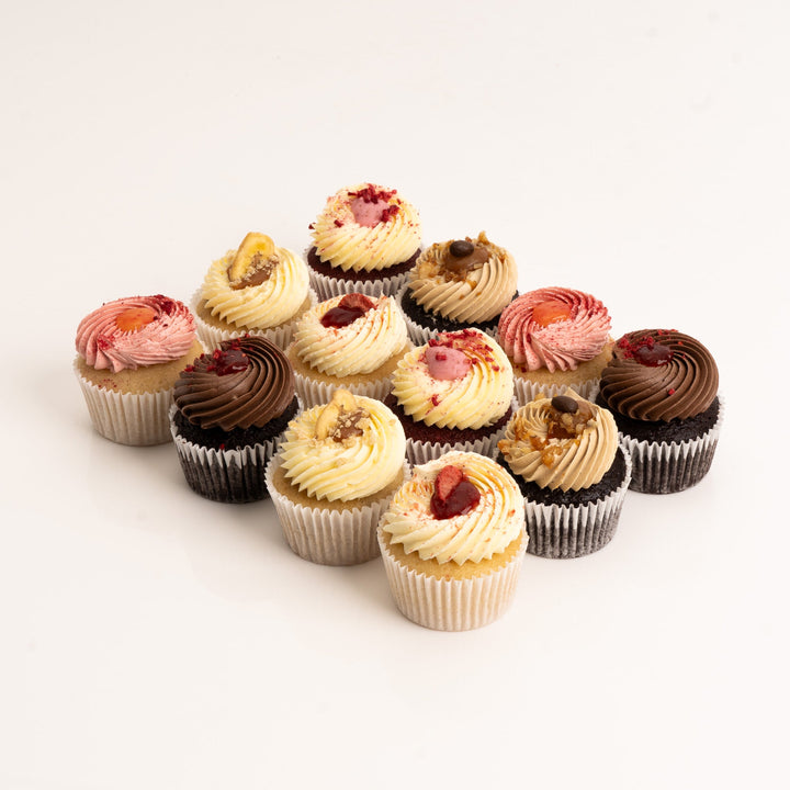 Assorted cupcake selection box featuring six handcrafted flavours.