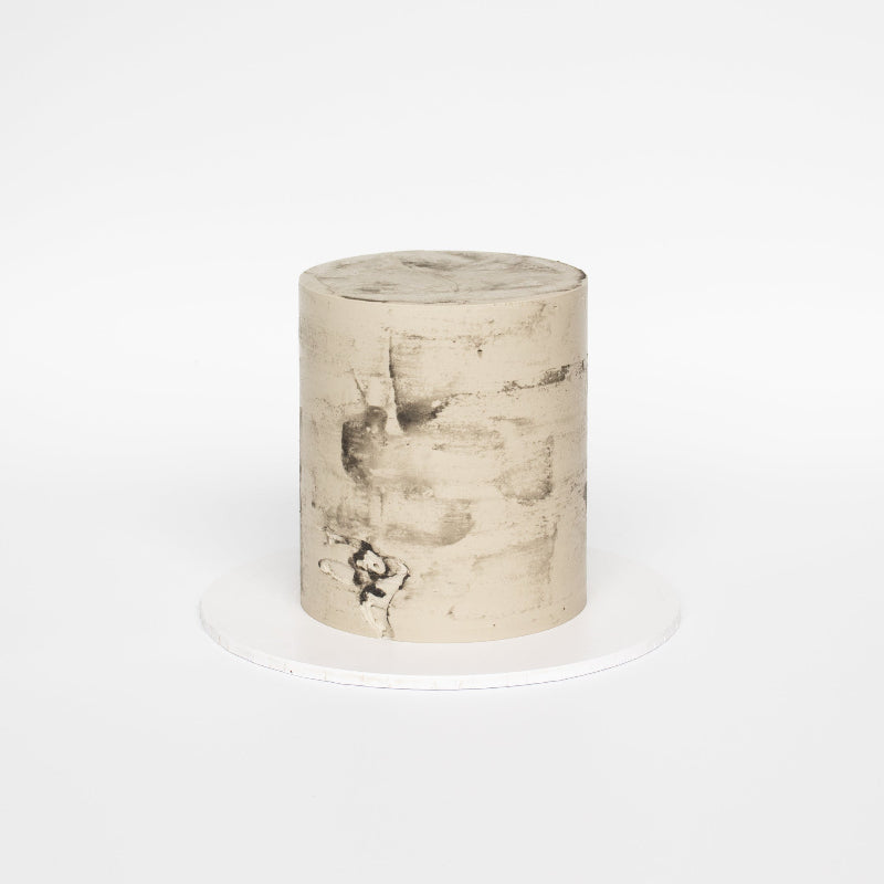Minimalist buttercream cake ready to decorate for birthdays or weddings.