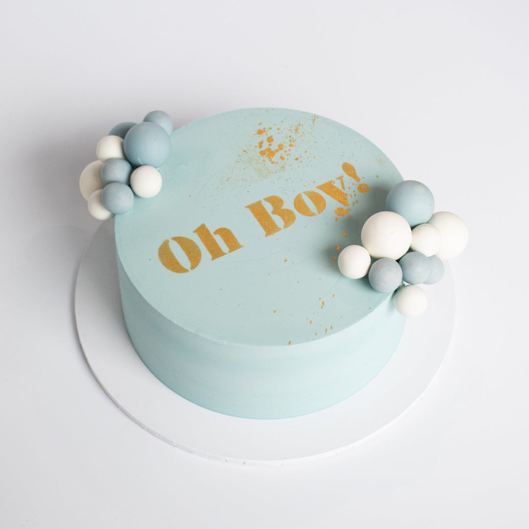 Bubble cake with smooth buttercream and edible chocolate bubble garland.