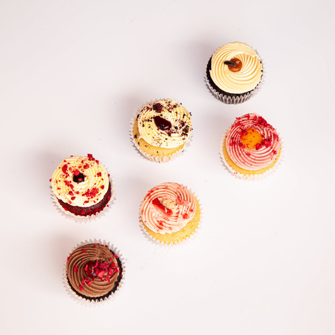 Assorted cupcake selection box featuring six handcrafted flavours.