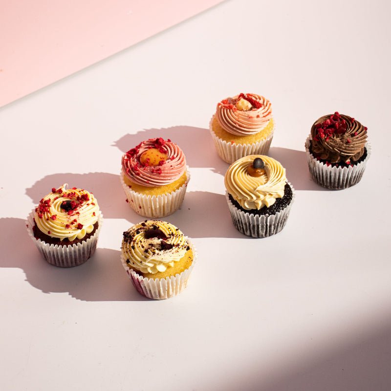 Assorted cupcake selection box featuring six handcrafted flavours.
