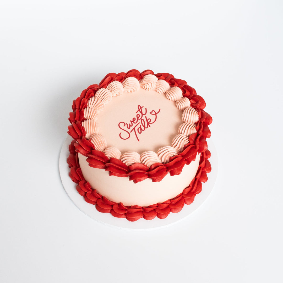 Vintage-style edible image cake with custom border and personalised design.