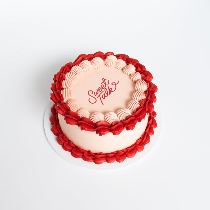 Vintage-style edible image cake with custom border and personalised design.