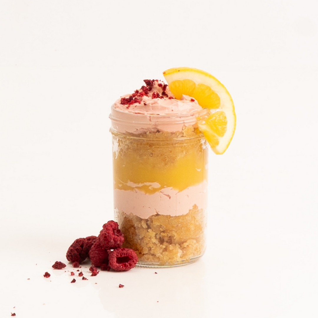 Lemon & Raspberry Cake Jar layered with sponge, tart curd, and cream.